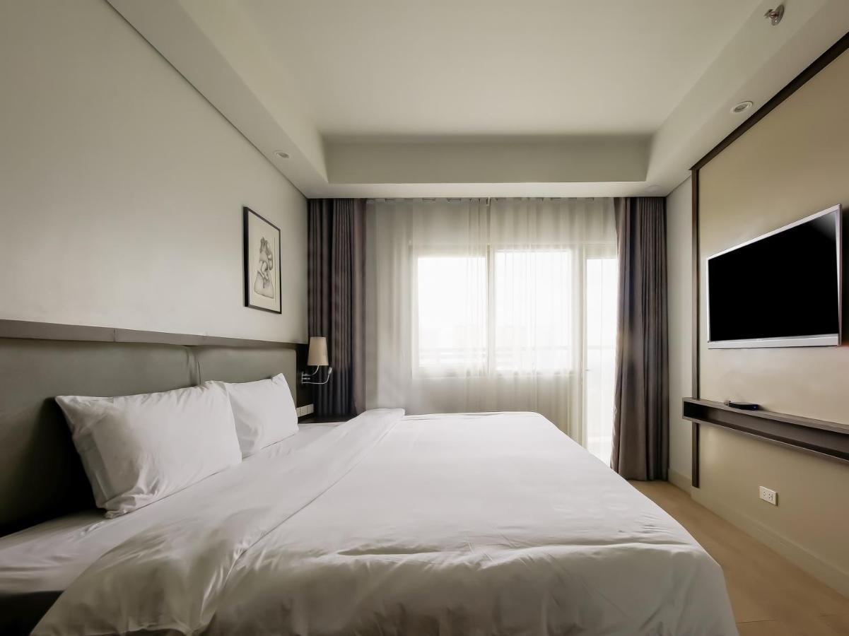 Capital O 804 The Residences At Bonifacio Civic Center Manila Exterior foto